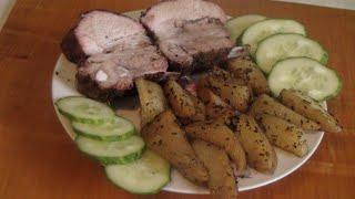 Свиные рёбрышки с картофелем, запеченные в духовке