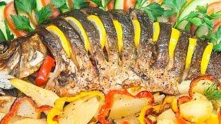 Рыба, фаршированная овощами, с картофелем, запеченная в духовке 